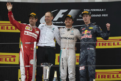 Second place Sebastian Vettel, Ferrari, Tony Ross, Race Engineer, Mercedes AMG F1, Nico Rosberg, Mercedes AMG F1, race winner, Daniil Kvyat, Red Bull Racing, third place, on the podium