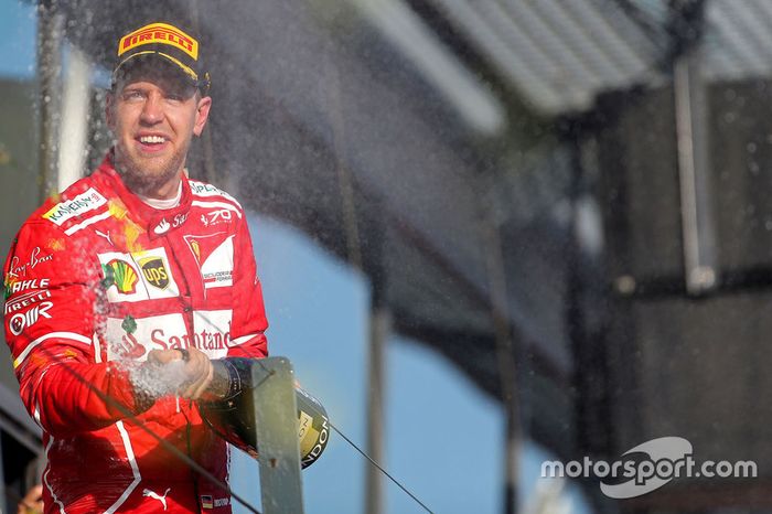 El ganador Sebastian Vettel, Ferrari