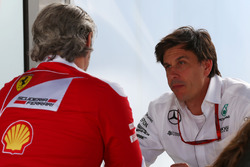 (L to R): Maurizio Arrivabene, Ferrari Team Principal with Toto Wolff, Mercedes AMG F1 Shareholder a