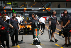 Haas F1 Team engineers in the pit lane