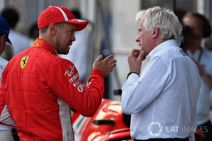 Sebastian Vettel, Ferrari and Charlie Whiting, FIA Delegate