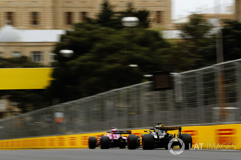 Sergio Perez, Force India VJM11 Mercedes, leads Nico Hulkenberg, Renault Sport F1 Team R.S. 18