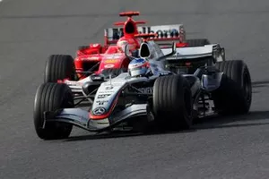 Kimi Raikkonen, McLaren Mercedes MP4/20 double Michael Schumacher, Ferrari F2005