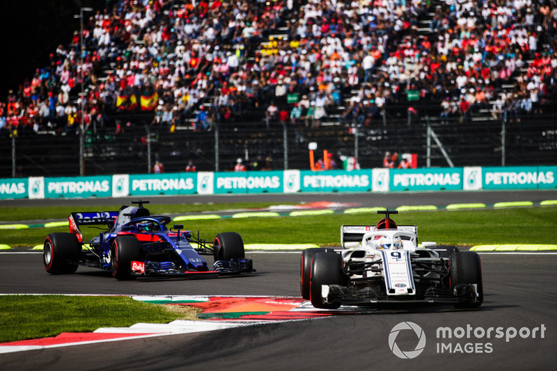 Marcus Ericsson, Sauber C37, leads Brendon Hartley, Toro Rosso STR13