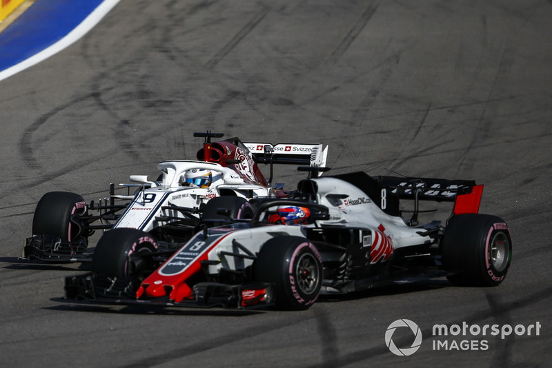 Romain Grosjean, Haas F1 Team VF-18 and Marcus Ericsson, Sauber C37