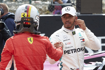 Sebastian Vettel, Ferrari, congratulates Lewis Hamilton, Mercedes AMG F1, on pole