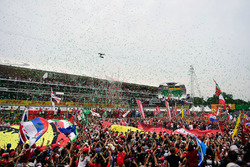 The podium (L to R): second place Lewis Hamilton, Mercedes AMG F1; Race winner Nico Rosberg, Mercede