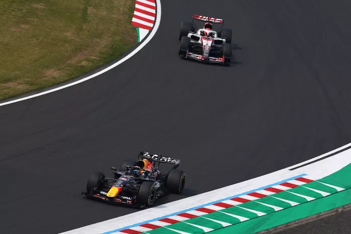 Max Verstappen, Red Bull Racing, Esteban Ocon, Haas F1 Team
