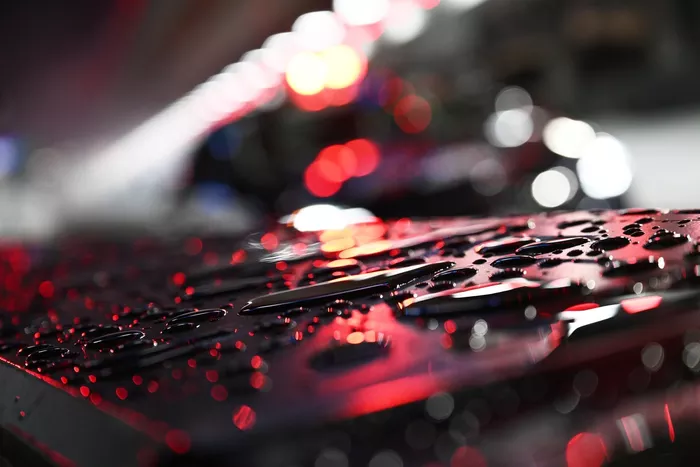 Rain is seen on the pitwall