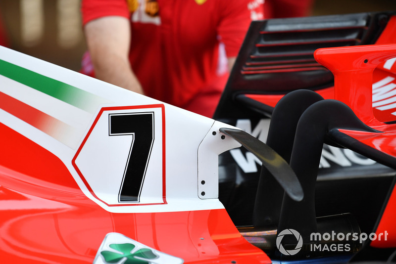 It's a not a new concept, but it is worth noting Ferrari’s arched T-Wing, hung from their engine cover.