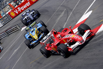 Michael Schumacher, Ferrari 248F1, Giancarlo Fisichella, Renault R26