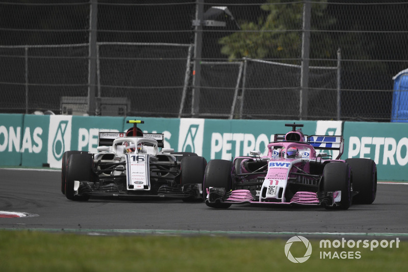 Charles Leclerc, Sauber C37 and Sergio Perez, Racing Point Force India VJM11 battle