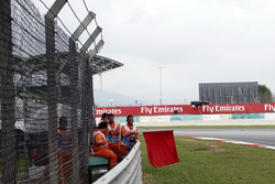 Marshal waves the red flag