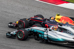 Max Verstappen, Red Bull Racing RB13, passes Lewis Hamilton, Mercedes AMG F1 W08, for the lead