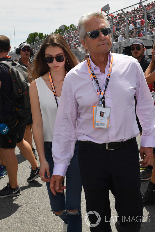Michael Douglas, with his son Dylan Douglas, and daughter Carys Zeta-Douglas, on the grid