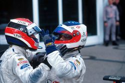 Johnny Herbert and Rubens Barrichello celebrate Stewart Grand Prix victory