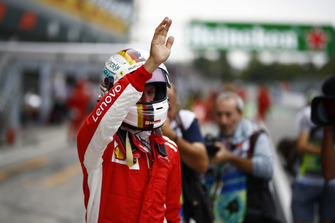 Sebastian Vettel, Ferrari waves to the fans after FP2