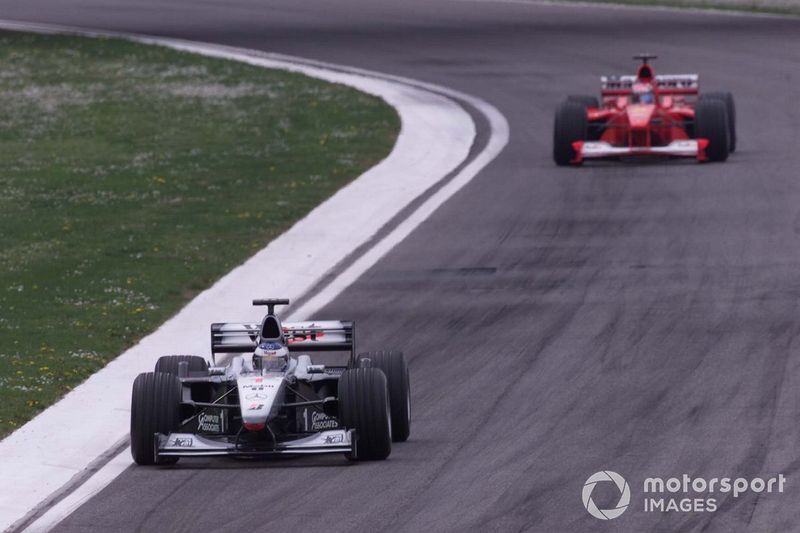 Mika Hakkinen, McLaren, leads Michael Schumacher, Ferrari