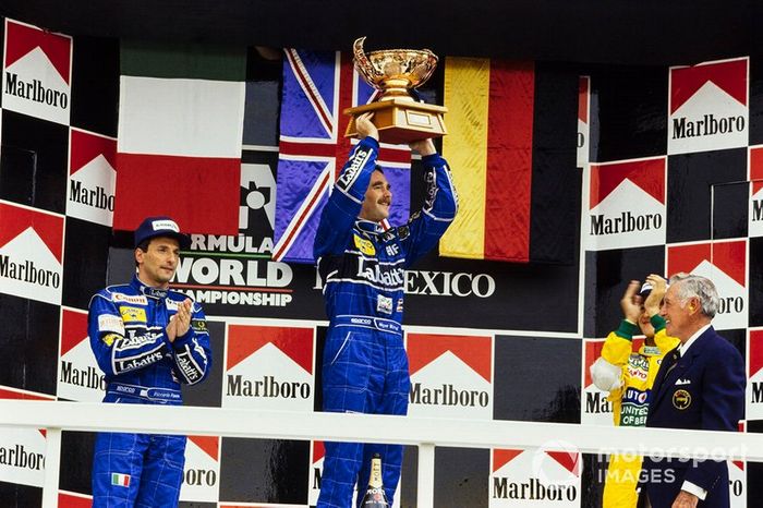 Podio: ganador Nigel Mansell, Williams, segundo Riccardo Patrese, Williams, tercero Michael Schumacher, Benetton