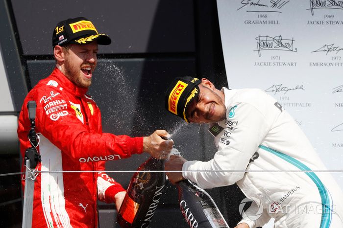 Sebastian Vettel, Ferrari, y Lewis Hamilton, Mercedes AMG F1