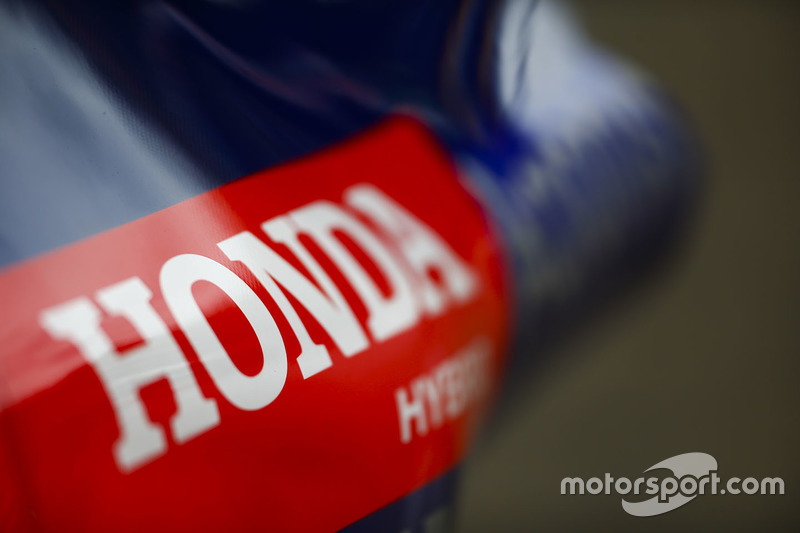 A Honda engine logo on the bodywork