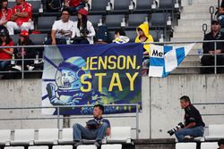 Fans in the grandstand and a banner for Jenson Button, McLaren