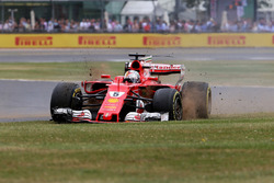 Sebastian Vettel, Ferrari SF70H, with a front puncture
