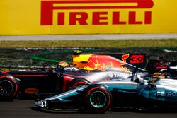 Max Verstappen, Red Bull Racing RB13, passes Lewis Hamilton, Mercedes AMG F1 W08