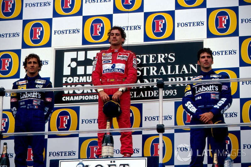 Podio: segundo lugar Alain Prost, Williams, ganador de la carrera Ayrton Senna, McLaren, tercer luga