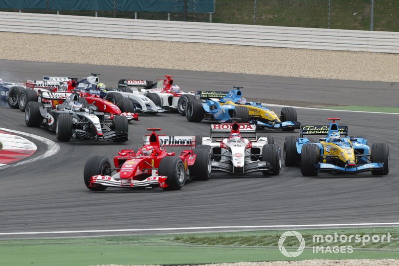 Michael Schumacher, Ferrari F2004 leads the start