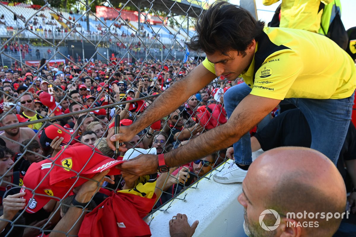 Carlos Sainz, Ferrari, signs autographs after the Italian GP