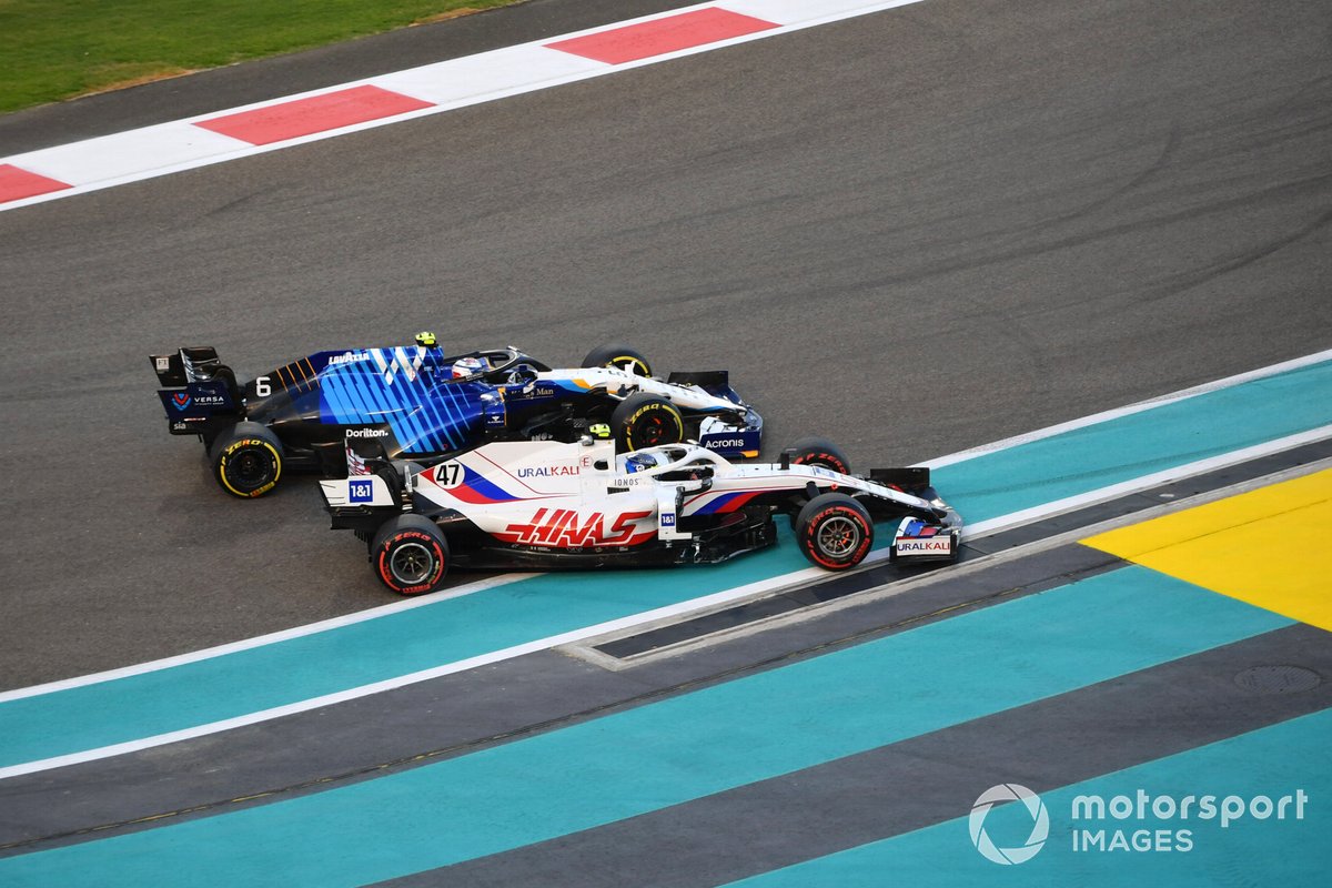 Mick Schumacher, Haas VF-21, battles with Nicholas Latifi, Williams FW43B