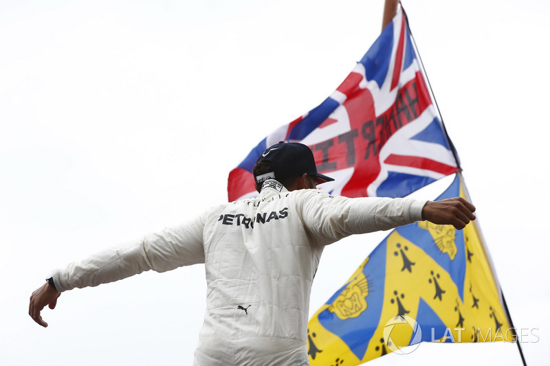 Race winner Lewis Hamilton, Mercedes AMG F1, celebrates with the fans