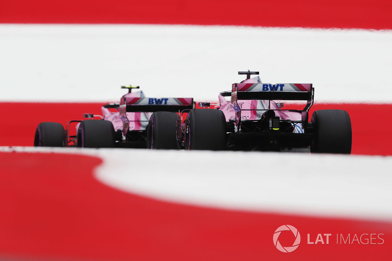 Esteban Ocon, Force India VJM11, leads Sergio Perez, Force India VJM11