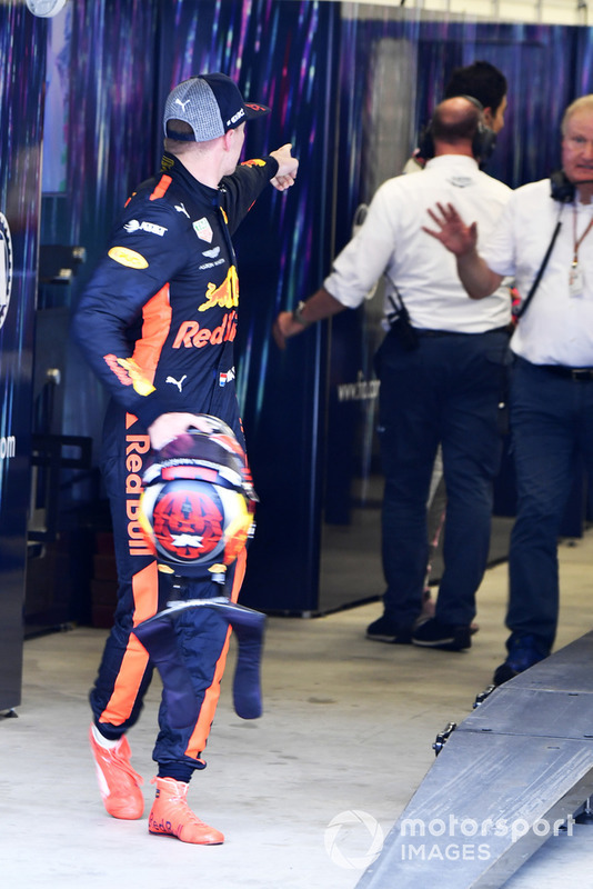Max Verstappen, Red Bull Racing and Esteban Ocon, Racing Point Force India square up after the race following their on track crash