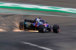 Sparks fly from the car of Brendon Hartley, Toro Rosso STR13 Honda