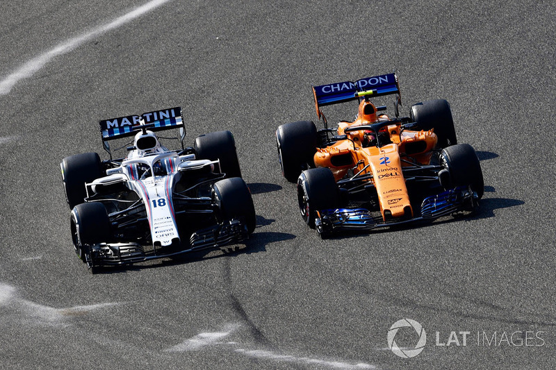 Lance Stroll, Williams FW41 ve Stoffel Vandoorne, McLaren MCL33