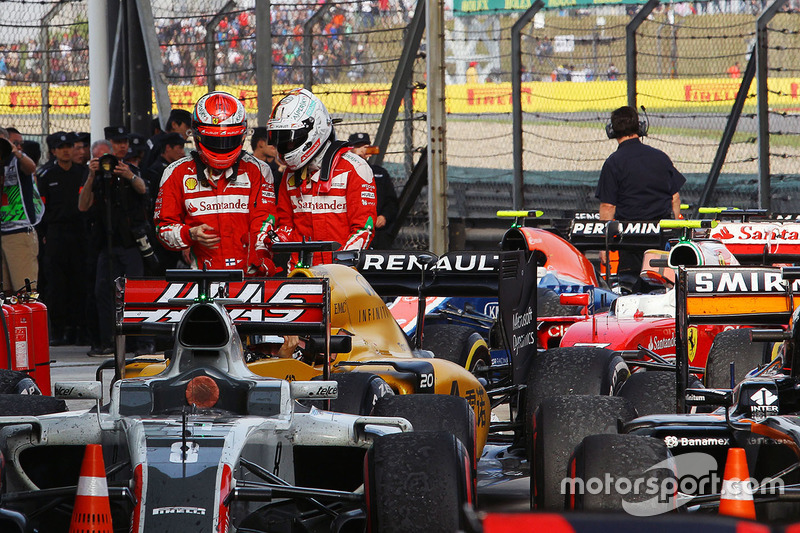 Kimi Raikkonen, Ferrari with team mate Sebastian Vettel, Ferrari in parc ferme