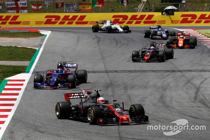Kevin Magnussen, Haas F1 Team VF-17, Carlos Sainz Jr., Scuderia Toro Rosso STR12, Romain Grosjean, Haas F1 Team VF-17