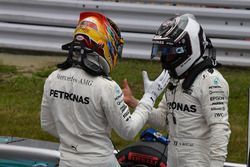 Pole sitter Lewis Hamilton, Mercedes AMG F1 and Valtteri Bottas, Mercedes AMG F1 celebrate in parc ferme