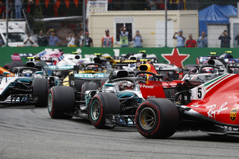 Sebastian Vettel, Ferrari SF71H, leads Lewis Hamilton, Mercedes AMG F1 W09