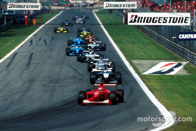 Michael Schumacher, Ferrari F1-2000, leads after the pace car returned to the pits