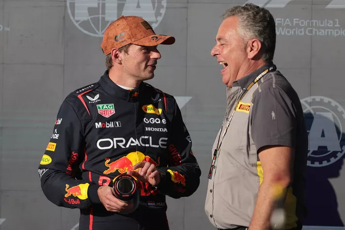 Max Verstappen, Red Bull Racing, Mario Isola, Director of Pirelli F1 