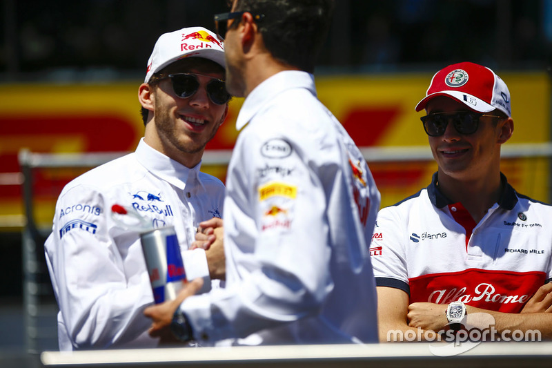 Pierre Gasly, Toro Rosso, Daniel Ricciardo, Red Bull Racing, and Charles Leclerc, Sauber, in the drivers parade
