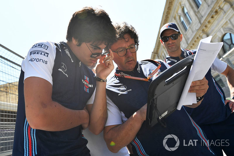 Lance Stroll, Williams Lance Stroll, Williams and Luca Baldisserri, Williams Race Engineer walk the track