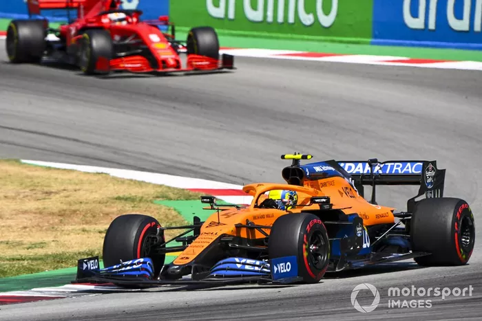 Lando Norris, McLaren MCL35, Sebastian Vettel, Ferrari SF1000