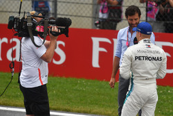 Valtteri Bottas, Mercedes-AMG F1 talks with Mark Webber, in parc ferme