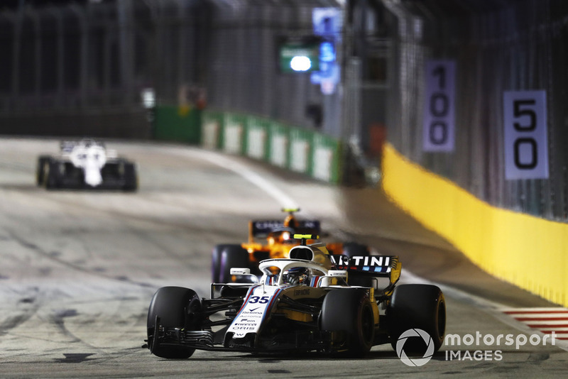 Sergey Sirotkin, Williams FW41, leads Stoffel Vandoorne, McLaren MCL33