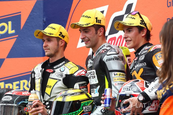 Podio: 1º Andrea Iannone, 2º Thomas Luthi, 3º Marc Márquez