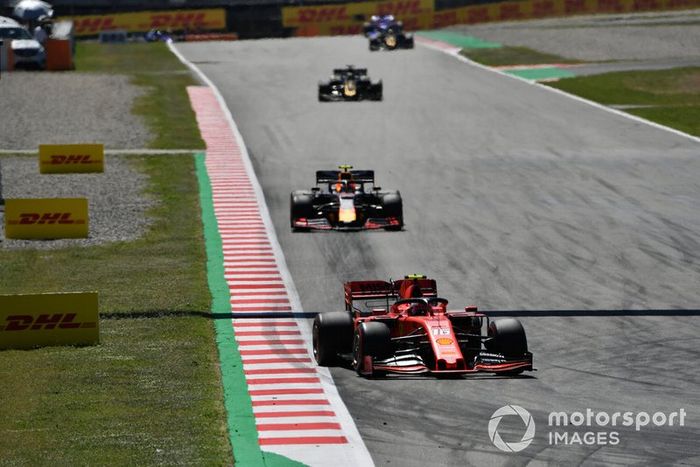 Charles Leclerc, Ferrari SF90, leads Pierre Gasly, Red Bull Racing RB15